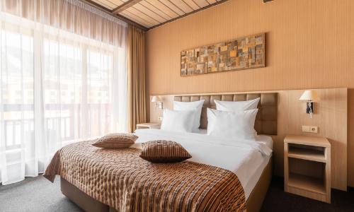 «Arkhyz Royal Resort & Spa» / «Архыз Роял Резорт и СПА» отель Архыз - Фото 2. Делюкс 2-местный 1-комнатный
