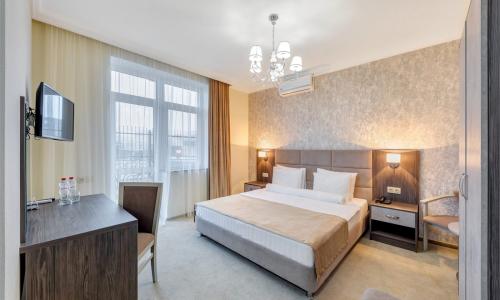 Отель «Rinn Rise Resort» / «Ринн Райз Резорт» Анапа - Фото 2. Комфорт 3-местный (вид на парк, бассейн)