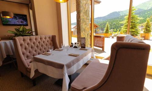 «Arkhyz Royal Resort & Spa» / «Архыз Роял Резорт и СПА» отель Архыз - Фото 23. Ресторан
